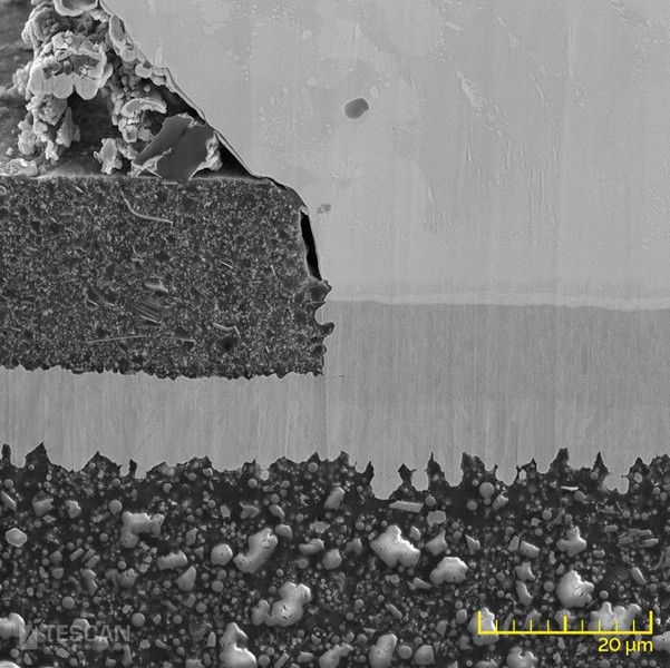 A detailed image showing grain contrast in the pad metal and under bump metallurgy layers