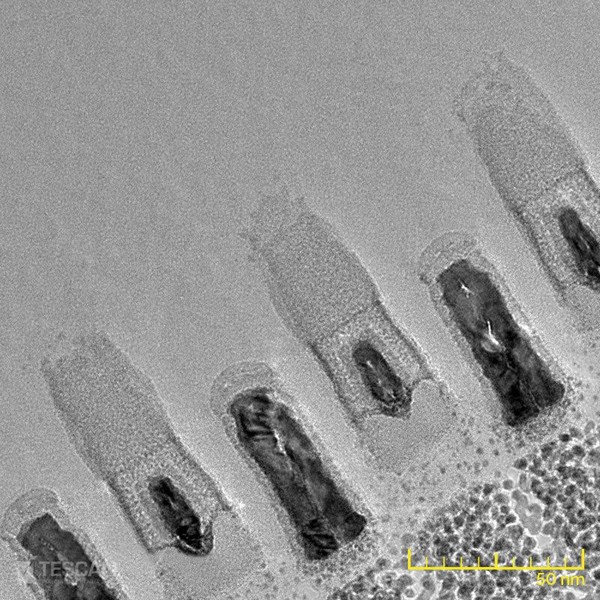 High resolution TEM image of a gate-cut lamella prepared from a 14 nm chip by means of inverted thinning High resolution TEM image of a gate-cut lamella prepared from a 14 nm chip by means of inverted thinning