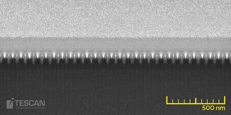 A 14 nm technology node Intel processor. A cross-section showing the transistor layers (“Gate-cut”) imaged at 5 keV with the In-Beam detector. A 14 nm technology node Intel processor. A cross-section showing the transistor layers (“Gate-cut”) imaged at 5 keV with the In-Beam detector.
