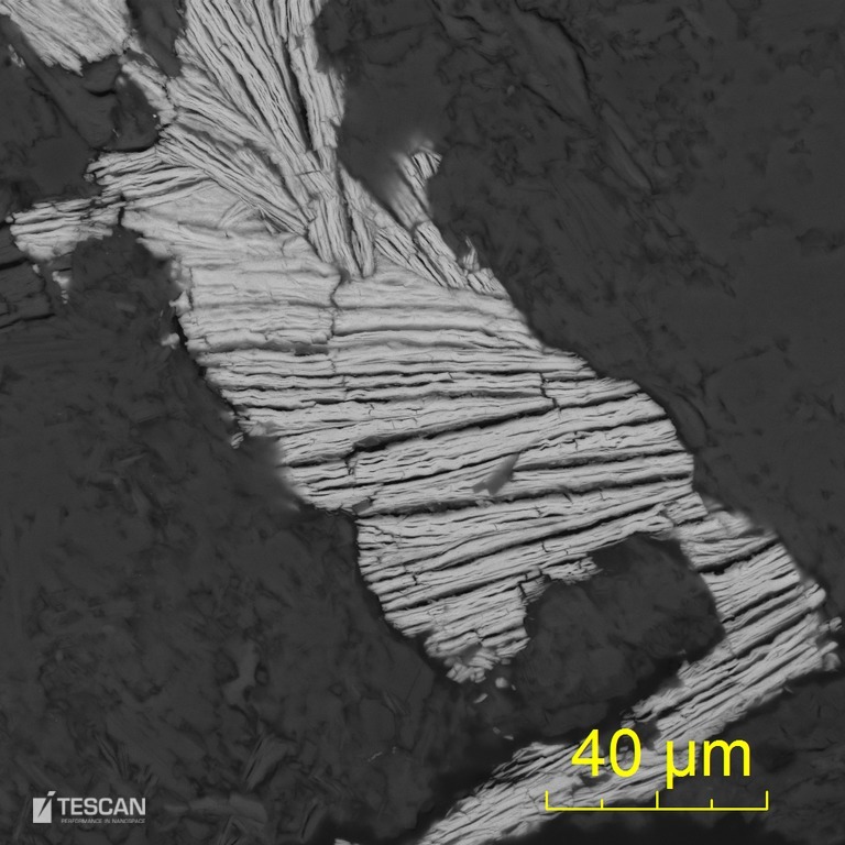 Autunite crystal filling voids in goethite Autunite crystal filling voids in goethite
